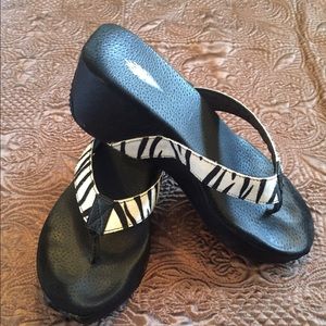 Volatile Zebra Striped Flip Flop