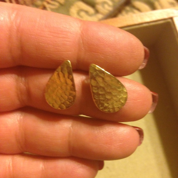 Gold tone hammered design pierced earrings.