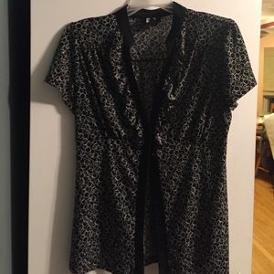 Blouse. Never worn. Polyester spandex