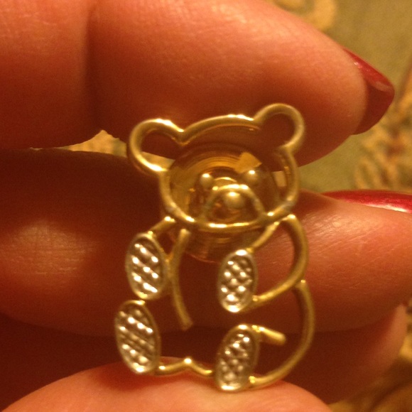 Adorable gold toned teddy bear pin.