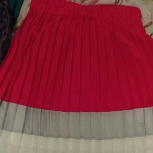 Knee length pleated skirt