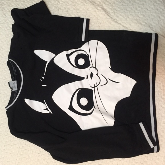 Black sweater with adolescent flower face
