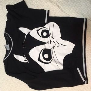 Black sweater with adolescent flower face