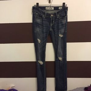 Distressed Buckle Jeans