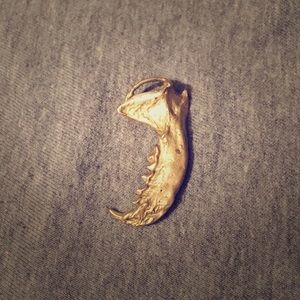 Brass VERAMEAT jaw bone pendant