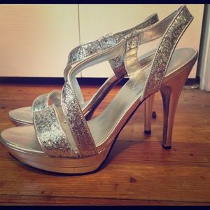 Guess high heels worn only once. Size 10. Silver.
