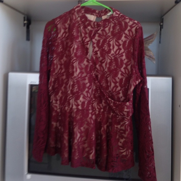 Very beautiful mock neck, long sleeved shirt