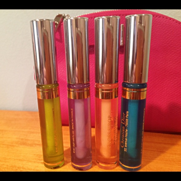 Dior Lip Glosses. Coach can be purchased separate