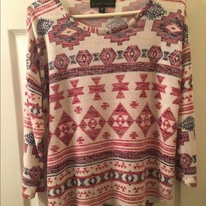 A red,white, & navy blue long sleeve shirt