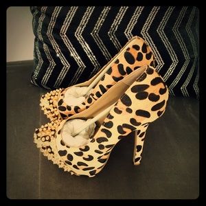 Leopard platform pumps with gold stones