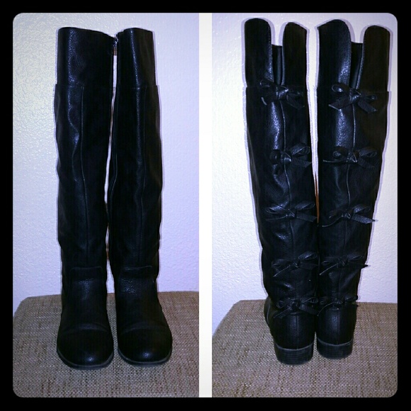 Knee high bowtie boots
