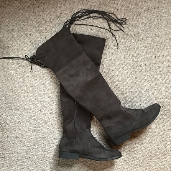 Chocolate brown over the knee high suede boots.New