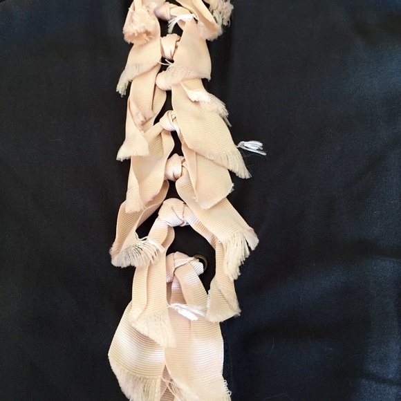 Soft, delicate bow shirt