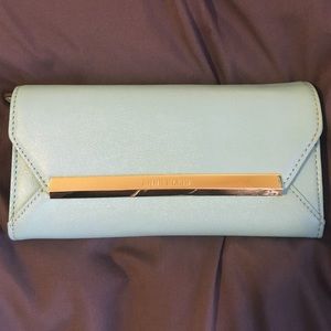 Anne Klein mint clutch.