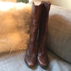 Brown leather boots with gold back zipper
