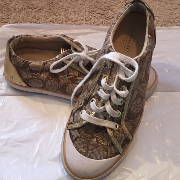 Coach sneakers used but in good shape
