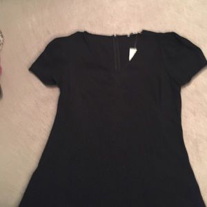 brand new black shirt with zipper on the back