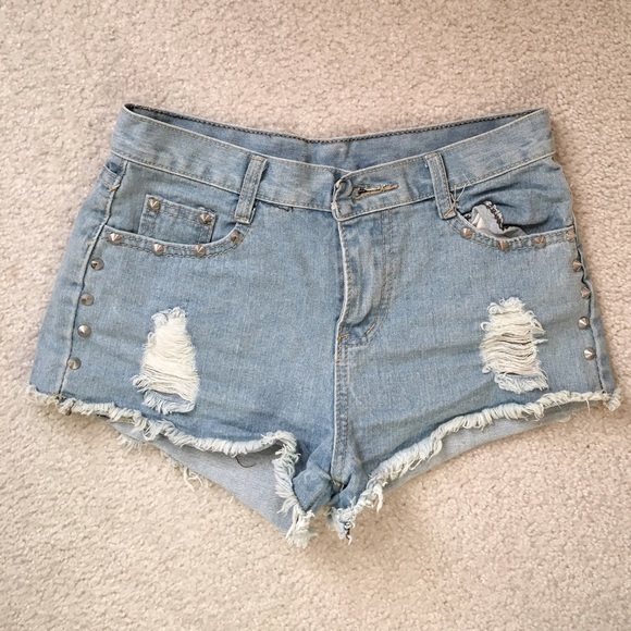 Light wash denim studded ripped shorts
