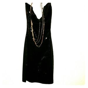Sequined little black dress