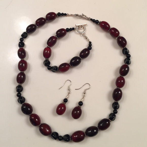 Necklace, bracelet and earrings.