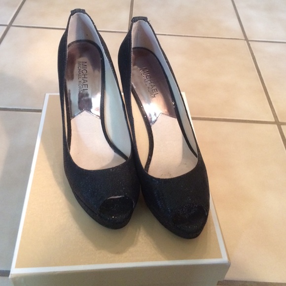 Black, open-toed Michael Kors heels