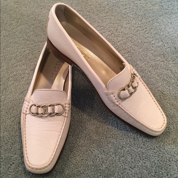 Escada loafers with brass chain details.