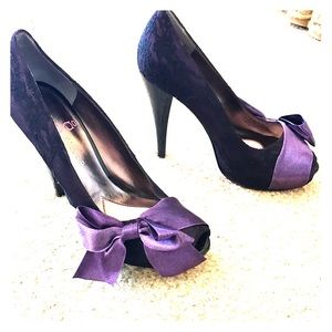 Purple and black Paris Hilton heels!