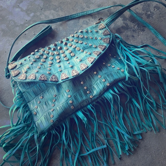 Buckle turquoise fringe bag