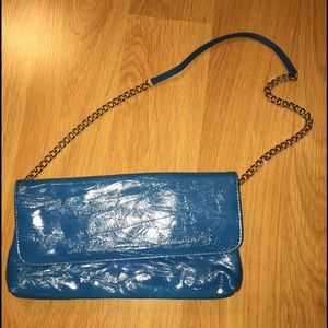 Teal clutch with strap