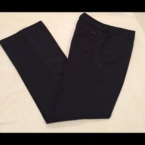 Pin-striped black pants