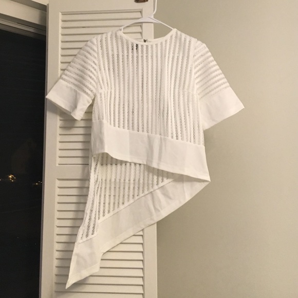 Asymmetrical short sleeve shirt. Never worn