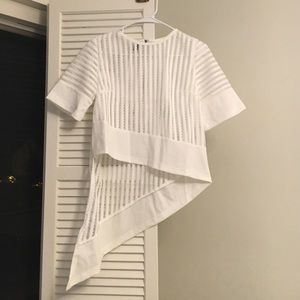 Asymmetrical short sleeve shirt. Never worn