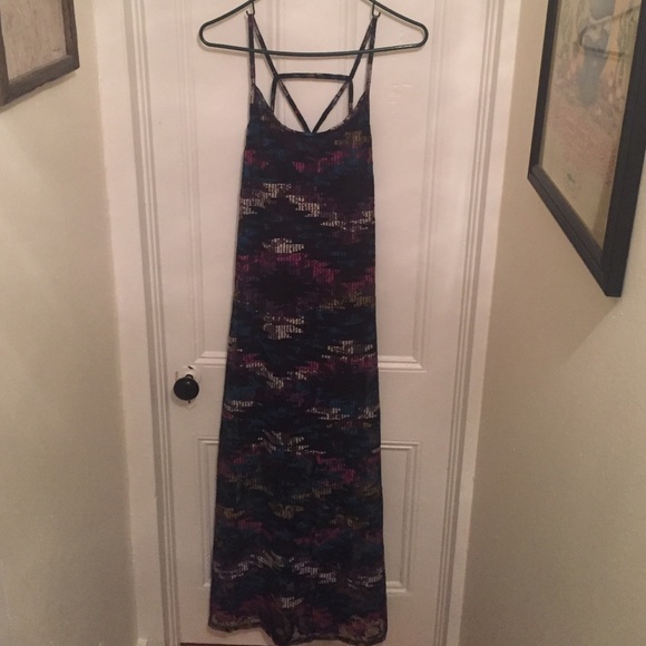 Lace maxi dress with a short purple slip