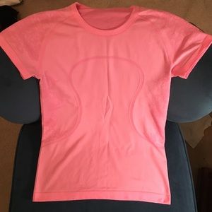 Pink Lululemon short sleeve shirt