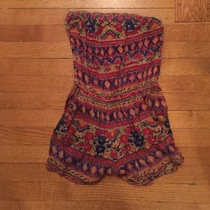 Multi colored romper with pockets!