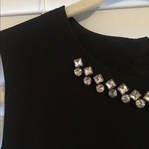 Structured black peplum top