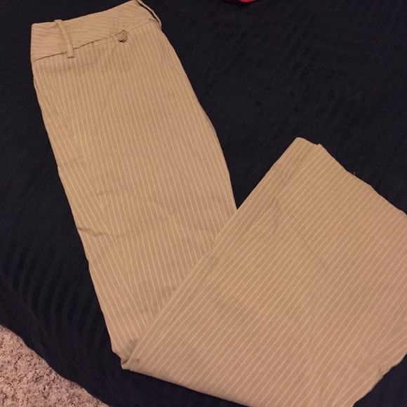 Tan and white pinstriped drew cut pants