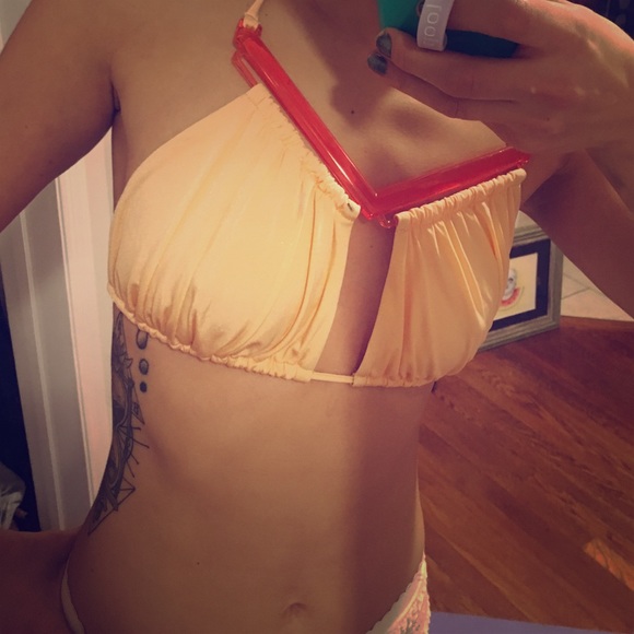 Plastic accented bikini top in **creamsicle**