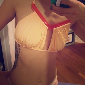 Plastic accented bikini top in **creamsicle**