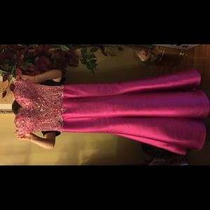 A pink satin Mori Lee dress