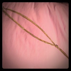 Mixed metal tassel necklace