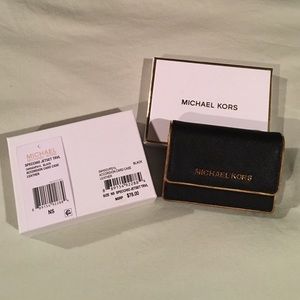 Michael Kors accordion card case.