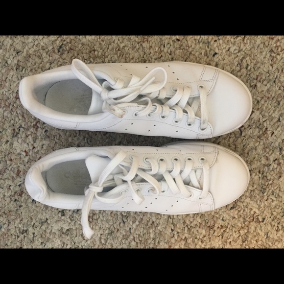 All white Stan Smith Adidas sneakers