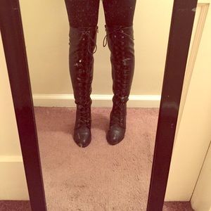 Over the knee leather boots.