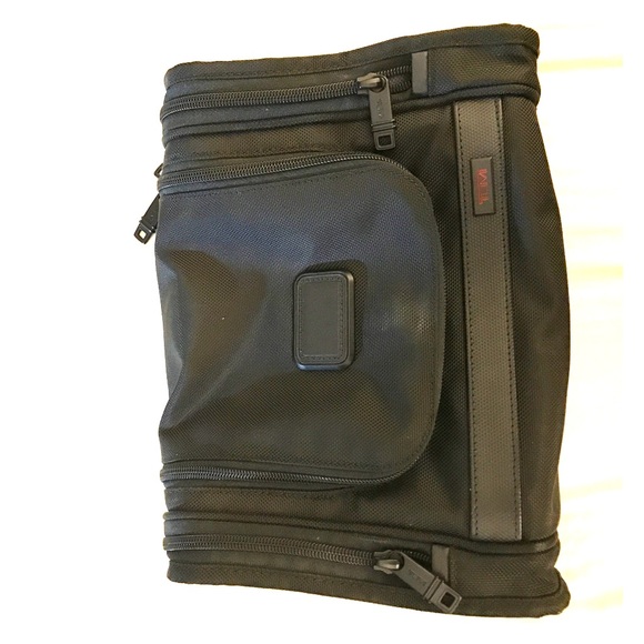 Brand new Tumi toiletry bag - don't use enough.