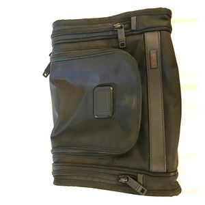 Brand new Tumi toiletry bag - don't use enough.