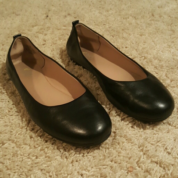 Black leather flats