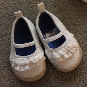 White eyelet crib shoes