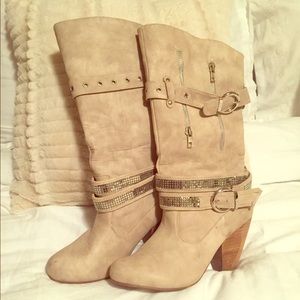 Cream colored boots from the Buckle