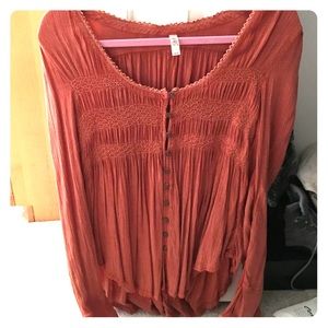 Free people tunic in pumpkin color